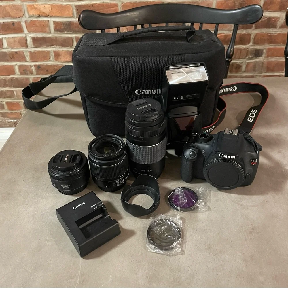 Canon EOS Rebel T5 with 3 lenses, external flash, and more
